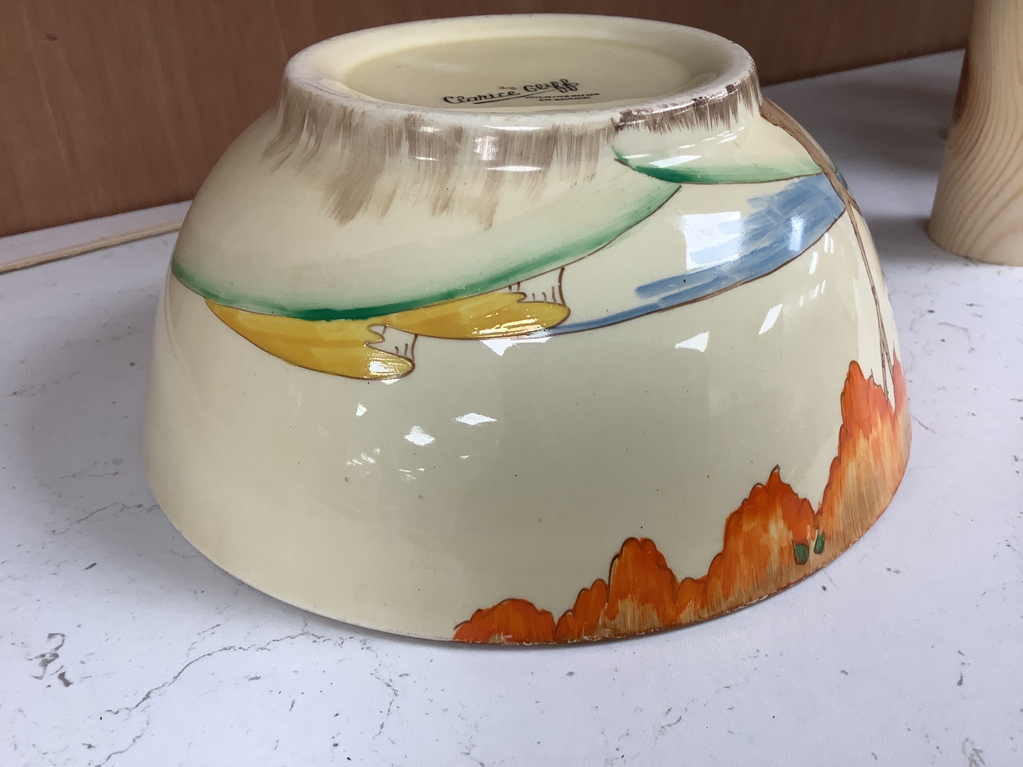 A Clarice Cliff landscape bowl, height 8cm diameter 18cm